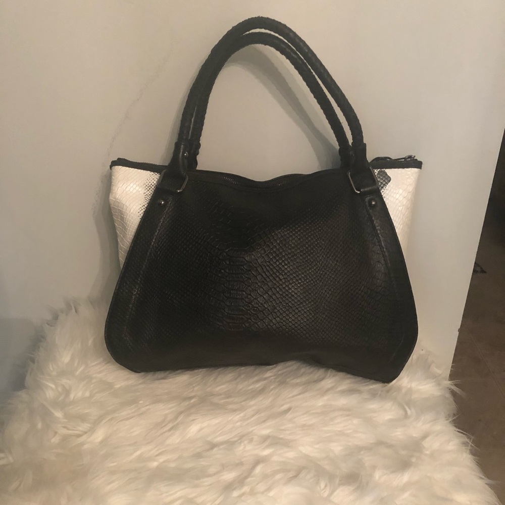 Eliot Lucca bah used twice excellent condition